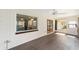 Bright sunroom offers easy access to kitchen and backyard at 8998 Sw 94Th St # D, Ocala, FL 34481