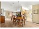 Well-lit dining room with easy access to the living room and kitchen for entertaining at 9131 Se 135Th St, Summerfield, FL 34491