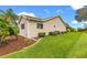 Well maintained landscaping with neatly trimmed bushes surrounding the home's exterior and siding at 9131 Se 135Th St, Summerfield, FL 34491