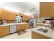 Bright kitchen with stainless steel appliances, oak cabinets, and ample counter space at 9131 Se 135Th St, Summerfield, FL 34491