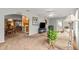 Spacious open-concept living area with a seamless flow to kitchen and dining room at 9131 Se 135Th St, Summerfield, FL 34491