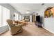 Inviting living room offering seamless access to the bedroom, creating a harmonious living space at 9131 Se 135Th St, Summerfield, FL 34491