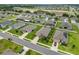 A beautiful view of a neighborhood street lined with well-kept homes and manicured lawns at 9237 Sw 60Th Terrace Rd, Ocala, FL 34476