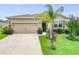 Charming single-Gathering home with a well-manicured lawn, complemented by mature landscaping and a two-car garage at 9237 Sw 60Th Terrace Rd, Ocala, FL 34476