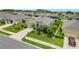 Beautiful home featuring manicured lawn, mature trees and colorful landscaping at 9237 Sw 60Th Terrace Rd, Ocala, FL 34476