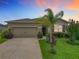 Charming single-Gathering home with a well-manicured lawn, complemented by mature landscaping and a two-car garage at 9237 Sw 60Th Terrace Rd, Ocala, FL 34476