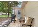 The backyard features an outdoor grill and seating area at 9290 Sw 89Th Ter # D, Ocala, FL 34481
