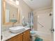 Bathroom features a modern sink with a shower and tub combination at 9290 Sw 89Th Ter # D, Ocala, FL 34481