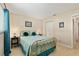 Bedroom with a closet for storage and a window for natural light at 9290 Sw 89Th Ter # D, Ocala, FL 34481