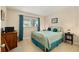 Bedroom with a window for natural light and neutral colored walls at 9290 Sw 89Th Ter # D, Ocala, FL 34481