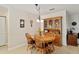 Charming dining space with classic wood furniture and natural light at 9290 Sw 89Th Ter # D, Ocala, FL 34481