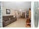 Cozy living room features light wood floors and a comfortable couch at 9290 Sw 89Th Ter # D, Ocala, FL 34481