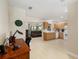 Inviting open-concept layout seamlessly connects the kitchen, living, and dining areas for easy living at 9290 Sw 89Th Ter # D, Ocala, FL 34481