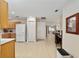 Spacious living area with an open floor plan and direct access to the kitchen at 9290 Sw 89Th Ter # D, Ocala, FL 34481