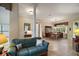 Inviting living space features a decorative column, and opens up to the dining and sitting areas at 9459 Se 124Th Loop, Summerfield, FL 34491