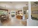 Open-concept living space with dining area, tile flooring, and a seamless flow for comfortable living at 9459 Se 124Th Loop, Summerfield, FL 34491