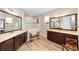 Elegant Primary bath features dual sinks, spacious shower, and dark wood cabinets at 9607 Sw 79Th Lane Rd, Ocala, FL 34481