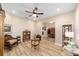 Inviting living room with neutral walls, a ceiling fan, and decorative furniture at 9607 Sw 79Th Lane Rd, Ocala, FL 34481