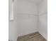 Walk-in closet showcasing white wire shelving units at 9813 Sw 105Th Ct, Ocala, FL 34481