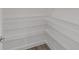 Spacious walk-in pantry with ample white wire shelving at 9813 Sw 105Th Ct, Ocala, FL 34481