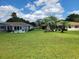 View of the back yard with neighboring properties at 10269 Sw 63Rd Ave, Ocala, FL 34476