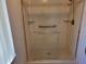 Clean shower with a glass door and tile surround at 10269 Sw 63Rd Ave, Ocala, FL 34476