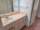 Bathroom featuring a single sink vanity with a mirror and tile flooring at 10269 Sw 63Rd Ave, Ocala, FL 34476
