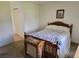 Comfortable bedroom featuring a wooden bed and furniture, carpet floors, and natural light at 10269 Sw 63Rd Ave, Ocala, FL 34476