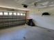 Empty two-car garage with automatic door, awaiting personal customization at 10269 Sw 63Rd Ave, Ocala, FL 34476