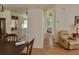 View of an open-concept kitchen and living space with tile flooring at 10269 Sw 63Rd Ave, Ocala, FL 34476