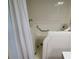 Accessible bathroom featuring walk-in tub with safety grab bar and handheld shower head at 10269 Sw 63Rd Ave, Ocala, FL 34476