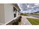 A stylish home with meticulous landscaping, a paver driveway, and attractive window accents at 10287 Sw 96Th Ln, Ocala, FL 34481