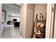 Inviting foyer with decorative accents and views into the living spaces at 10287 Sw 96Th Ln, Ocala, FL 34481