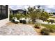 Beautiful backyard landscaping with a variety of plants and stone accents at 10287 Sw 96Th Ln, Ocala, FL 34481
