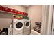 Convenient laundry room with washer, dryer, and storage at 10287 Sw 96Th Ln, Ocala, FL 34481