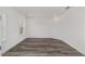 A bedroom showcases recessed lighting and a window overlooking a tree-lined street at 10553 Sw 98Th Pl, Ocala, FL 34481
