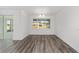 Dining room with wood-look floors and natural light at 10553 Sw 98Th Pl, Ocala, FL 34481