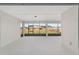 Covered lanai with screens and views of the backyard at 10553 Sw 98Th Pl, Ocala, FL 34481
