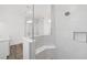 Tiled shower with glass enclosure and bench seating at 10553 Sw 98Th Pl, Ocala, FL 34481