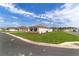 Sprawling well-maintained lawn surrounds a single-Gathering home, offering curb appeal at 10553 Sw 98Th Pl, Ocala, FL 34481
