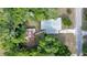 Bird's-eye view of home and detached garage, showcasing the roof and surrounding greenery at 1322 Ne 53Rd St, Ocala, FL 34479