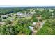 Aerial shot of the neighborhood and trees surrounding the house at 1322 Ne 53Rd St, Ocala, FL 34479