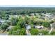 Neighborhood aerial view showcasing mature trees surrounding the property at 1322 Ne 53Rd St, Ocala, FL 34479