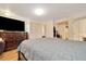 Well-lit primary bedroom with laminate floors, a large closet, and neutral decor at 1322 Ne 53Rd St, Ocala, FL 34479