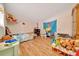Cozy bedroom with hardwood floors, fun decor and ample space for play at 1322 Ne 53Rd St, Ocala, FL 34479