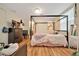 Comfortable bedroom featuring a bed and open closet at 1322 Ne 53Rd St, Ocala, FL 34479
