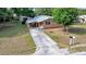 Charming single-story home featuring a covered carport and well-maintained front yard landscaping at 1322 Ne 53Rd St, Ocala, FL 34479