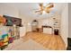 Spacious living room featuring wood floors and stainless steel appliances at 1322 Ne 53Rd St, Ocala, FL 34479