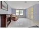 Room featuring a recliner, fireplace, and natural light at 1322 Ne 53Rd St, Ocala, FL 34479