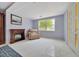 Room featuring a recliner, fireplace, and natural light at 1322 Ne 53Rd St, Ocala, FL 34479